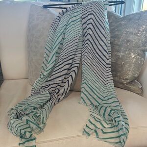 Teal, navy & white striped scarf.